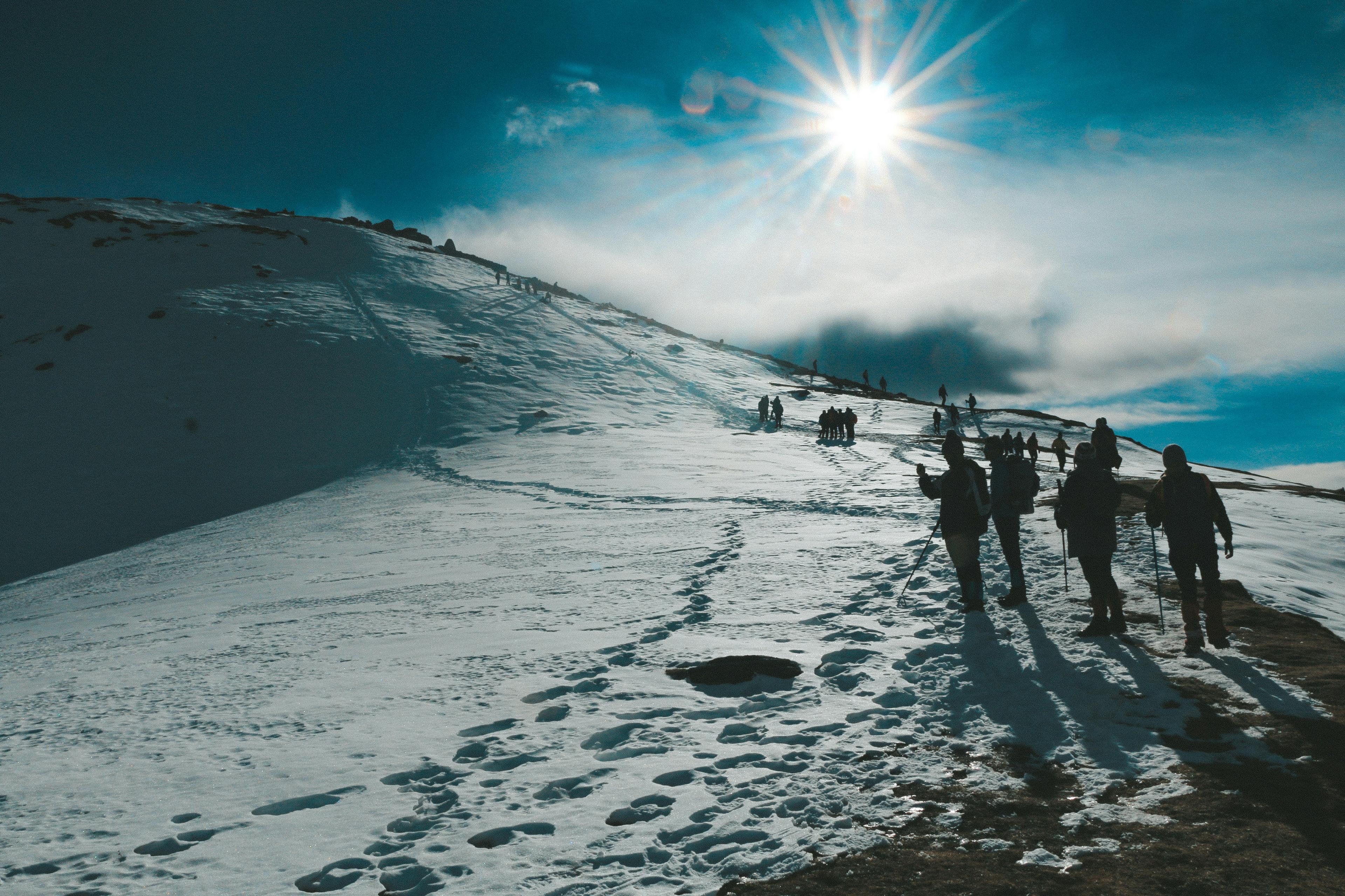 A Dramatic Peak vs. Endless Snow Meadows