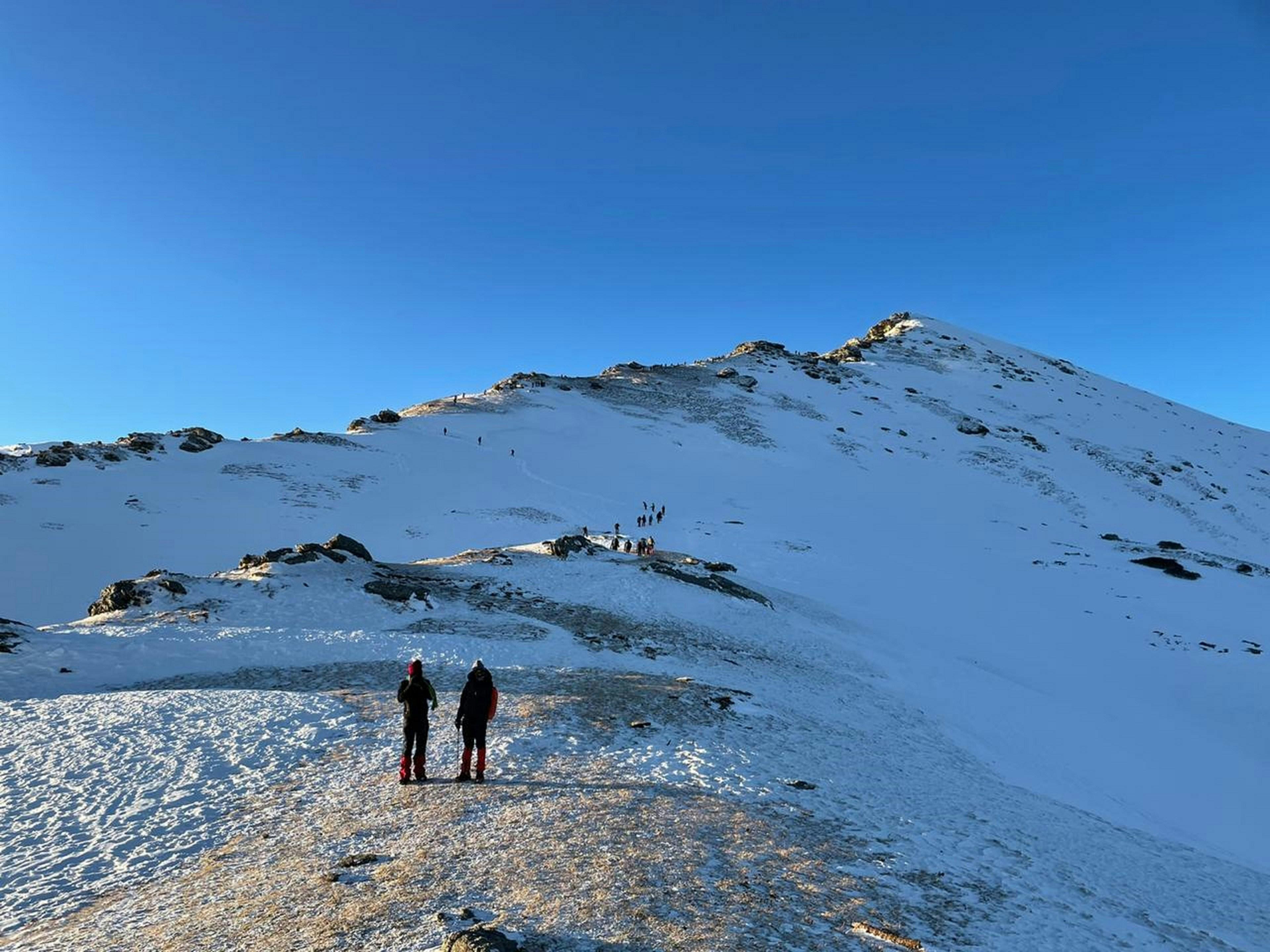 A Dramatic Peak vs. Endless Snow Meadows — image 2